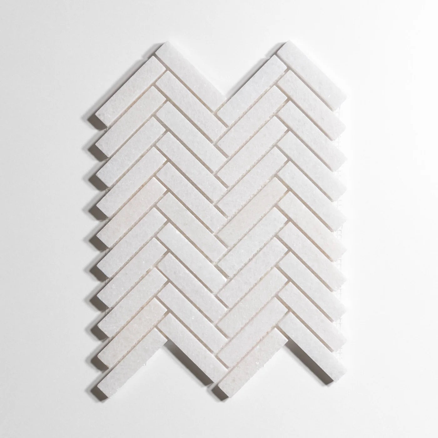 lucid_crystal_herringbone_1_X_4_11X15SHEET_Honed
