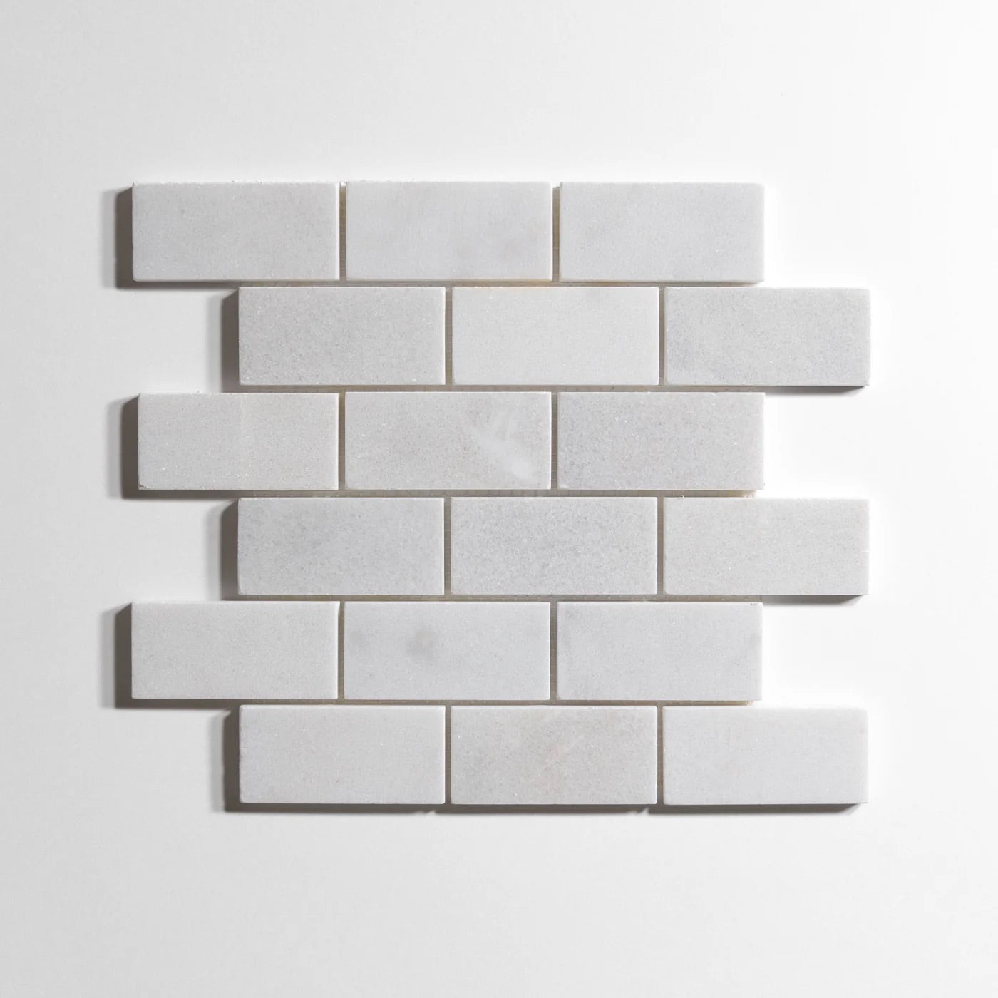 white_hailstone_brick_2_X_4_12X12SHEET_Honed
